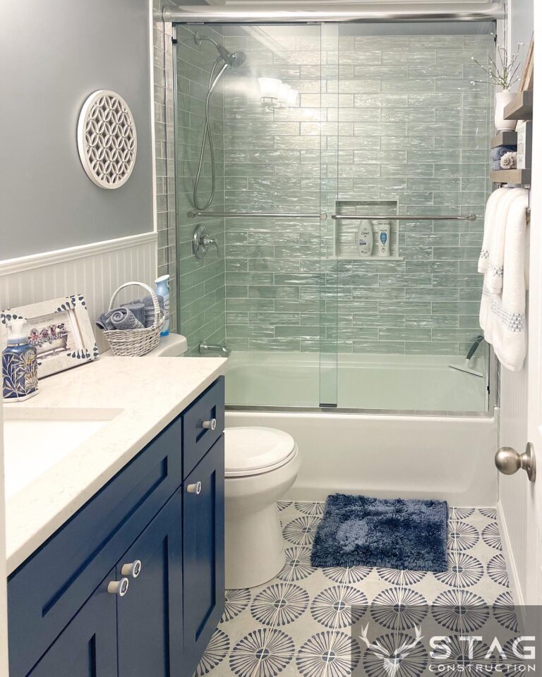 Beautiful blue vanity cabinets. Ocean themed bathroom